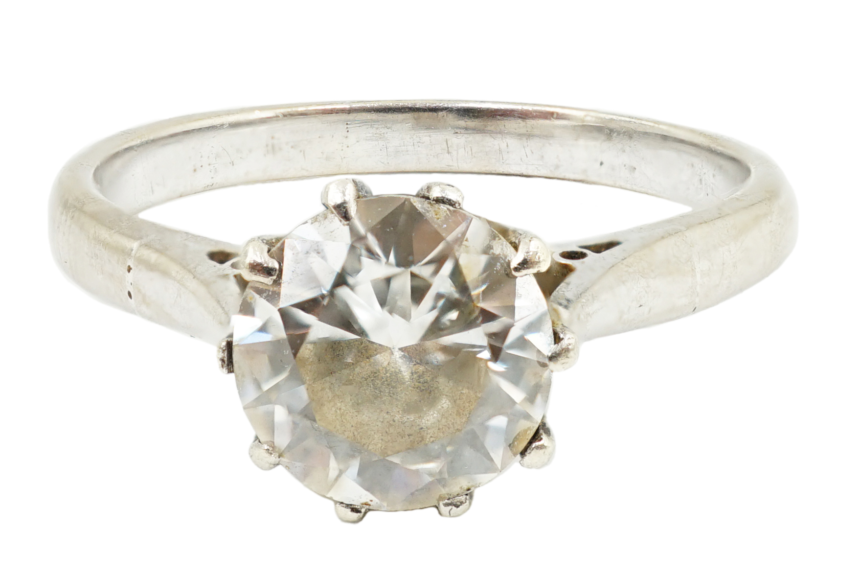 A white gold and solitaire diamond set ring